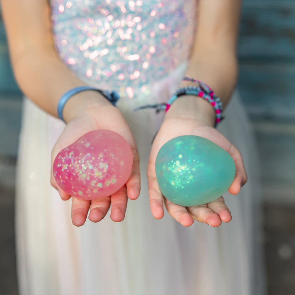 Great Pretenders Squishy ζουληχτή μπάλα αντιστρές με γκλίτερ (επιλογή από 6 χρώματα)