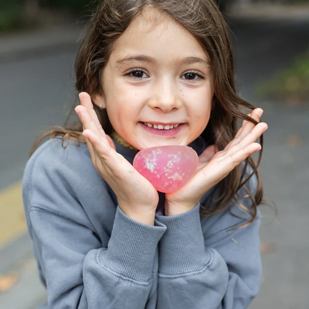 Great Pretenders Squishy ζουληχτή μπάλα αντιστρές με γκλίτερ (επιλογή από 6 χρώματα)